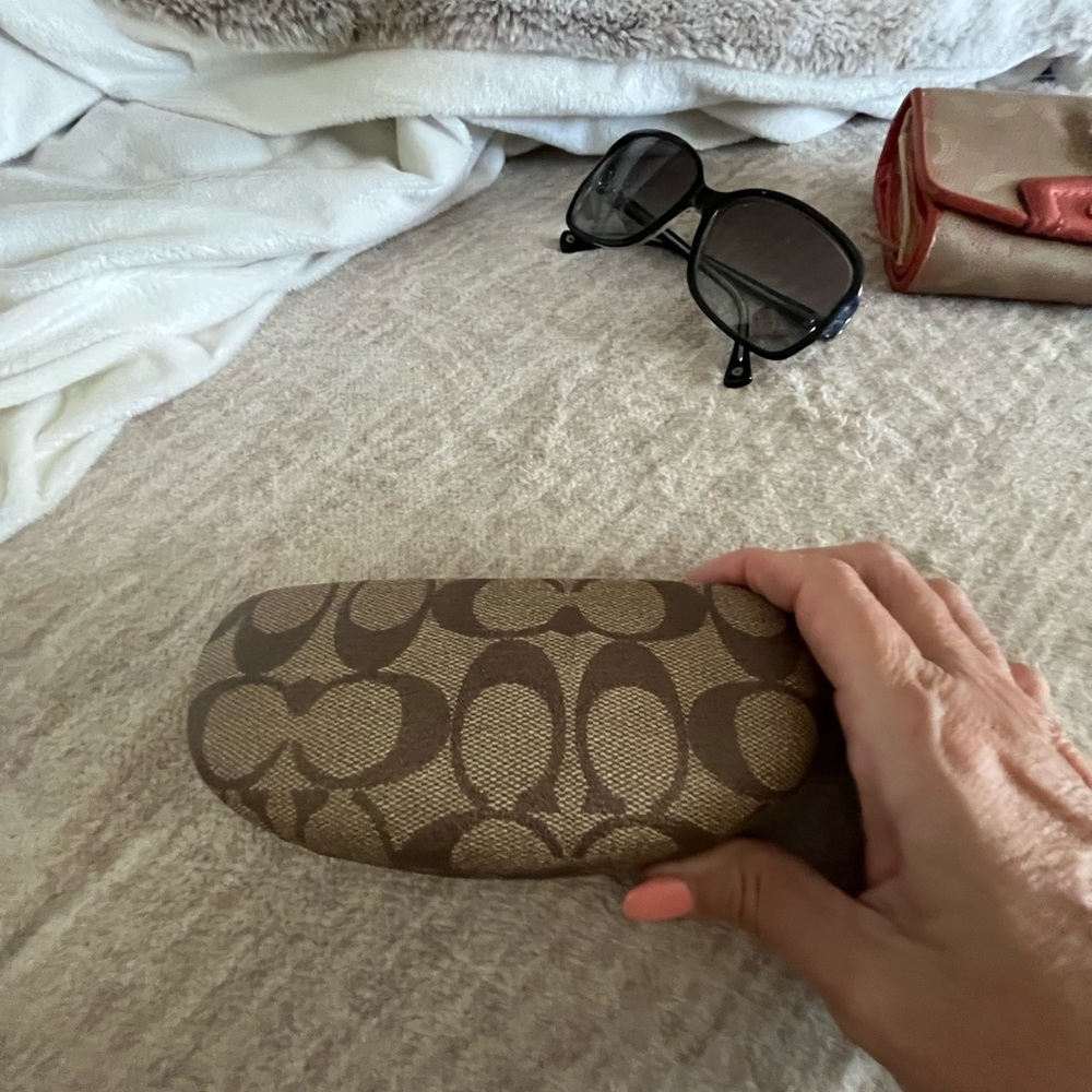 Tan Coach sunglasses case
